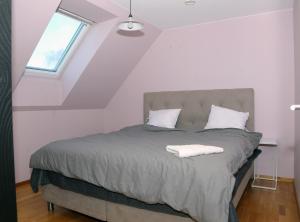 Ένα ή περισσότερα κρεβάτια σε δωμάτιο στο 5-Bed-Rooms House with Jacuzzi, Free Parking, and 2 Toilets-Bath in Malmö