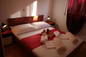 Postel nebo postele na pokoji v ubytování Apartments Central