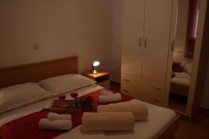 Postel nebo postele na pokoji v ubytování Apartments Central
