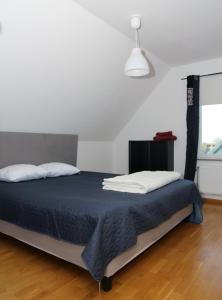 Ένα ή περισσότερα κρεβάτια σε δωμάτιο στο 5-Bed-Rooms House with Jacuzzi, Free Parking, and 2 Toilets-Bath in Malmö