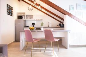 Kuchyň nebo kuchyňský kout v ubytování Apartments Filip