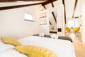 Postel nebo postele na pokoji v ubytování Apartments Filip