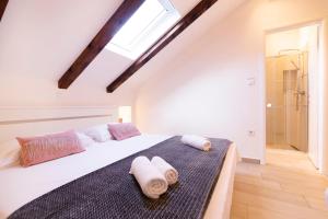 Postel nebo postele na pokoji v ubytování Apartments Filip