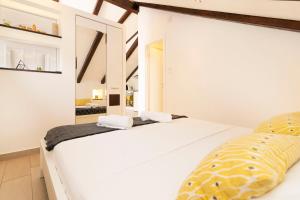 Postel nebo postele na pokoji v ubytování Apartments Filip
