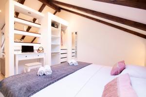 Postel nebo postele na pokoji v ubytování Apartments Filip