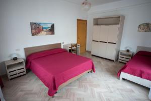 Ένα ή περισσότερα κρεβάτια σε δωμάτιο στο Residence Europa