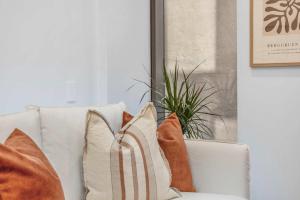 O zonă de relaxare la The Courtenay Chic Retreat 1BR Apartment