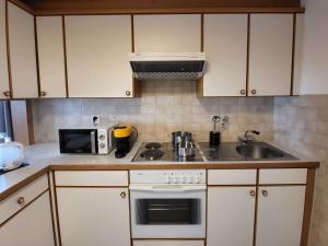 Una cocina o zona de cocina en Best Western Hotel Rebstock