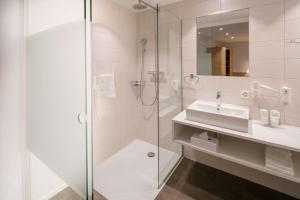 Un baño de Best Western Hotel Rebstock