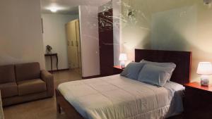 Letto o letti in una camera di Apricot Hotel