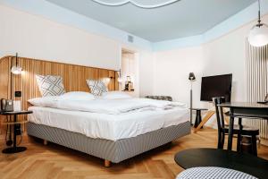 Una cama o camas en una habitación de Best Western Plus Hotel Bern