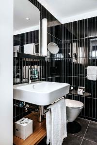 Un baño de Best Western Plus Hotel Bern