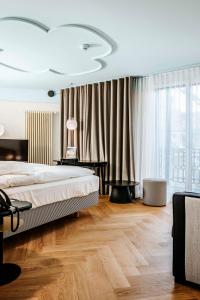 Una cama o camas en una habitación de Best Western Plus Hotel Bern