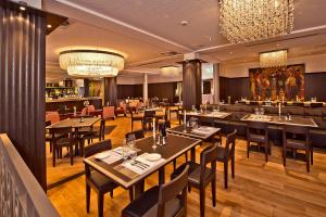 Un restaurante u otro lugar para comer en Best Western Plus Hotel Bern