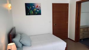 Letto o letti in una camera di Apricot Hotel