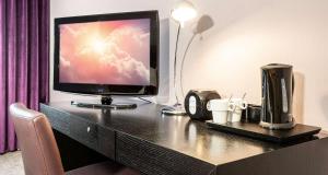 TV a/nebo společenská místnost v ubytování Best Western Victor's Residenz-Hotel Rodenhof + 41 fotografií