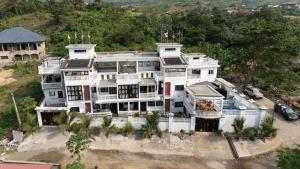 an aerial view of a large white building at Sky Guest Vila Limbe in Limbe