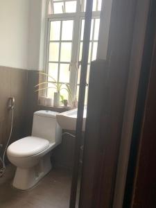 Vannituba majutusasutuses Pekoetrails Hantana Homestay