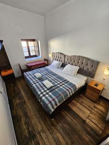 Postel nebo postele na pokoji v ubytování Cusco el Conquistador