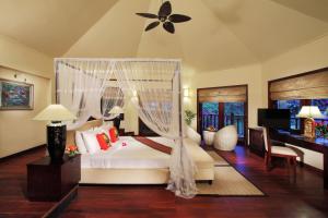 Llit o llits en una habitació de Poshanu Boutique Resort