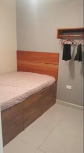Ένα ή περισσότερα κρεβάτια σε δωμάτιο στο Apartamento a Beira Mar