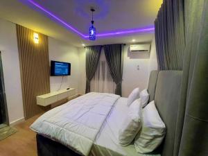 Postel nebo postele na pokoji v ubytování Akalis homes