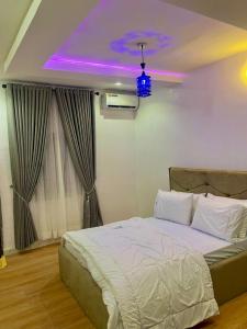 Postel nebo postele na pokoji v ubytování Akalis homes
