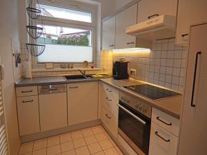 Η κουζίνα ή μικρή κουζίνα στο Stylish Ground-Floor Stay +32 φωτογραφίες