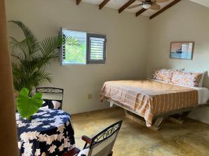 Katil atau katil-katil dalam bilik di Yes Papa! Rooms only 100m from the beach!