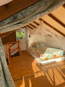Katil atau katil-katil dalam bilik di Yes Papa! Rooms only 100m from the beach!