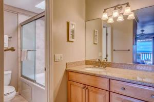 a bathroom with a sink and a shower and a toilet at A9 Direct Oceanfront 2 Level 2 Lanai Amazing Views Sunsets & AC Comfort in Lahaina