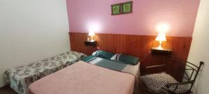 Ένα ή περισσότερα κρεβάτια σε δωμάτιο στο Lago Azul