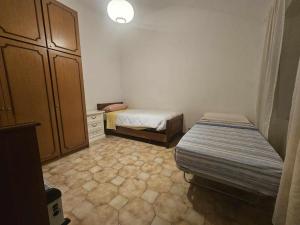 Ένα ή περισσότερα κρεβάτια σε δωμάτιο στο Mare e Pesto