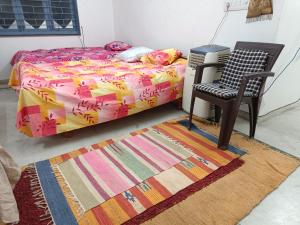 Postelja oz. postelje v sobi nastanitve Chintamani Siddhi Chakra - Only Family Rooms on Monthly Basis