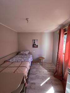 A bed or beds in a room at Oasis in the mountain, Quebrada Alvarado, Olmué