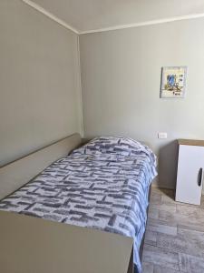 A bed or beds in a room at Oasis in the mountain, Quebrada Alvarado, Olmué