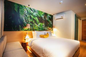 Postel nebo postele na pokoji v ubytování The Stay Chaweng Beach Resort- SHA Plus + 27 fotografií