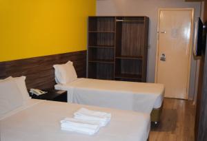 Cama o camas de una habitación en Bittar Inn