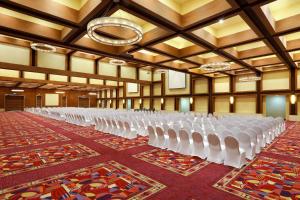 a large hall with rows of chairs in it at Aguascalientes Marriott Hotel in Aguascalientes +47 photos