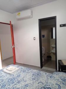 Voodi või voodid majutusasutuse Inmaculada Real Hotel toas