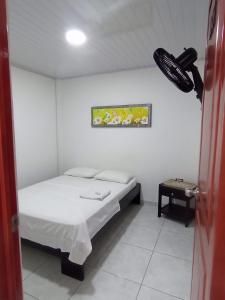 Voodi või voodid majutusasutuse Inmaculada Real Hotel toas