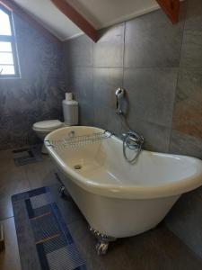 Ein Badezimmer in der Unterkunft Khoi-San