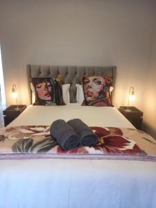 Ein Bett oder Betten in einem Zimmer der Unterkunft Khoi-San