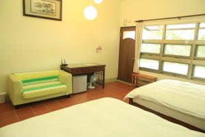 Katil atau katil-katil dalam bilik di Hualien Taroko Mountain Dream B&B