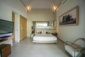 Postel nebo postele na pokoji v ubytování Bali Modern Escape With Private Pool, 8 guests