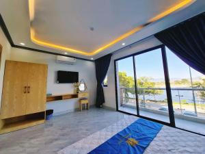 TV a/nebo společenská místnost v ubytování Phuong Linh Hotel - Ninh Thuận