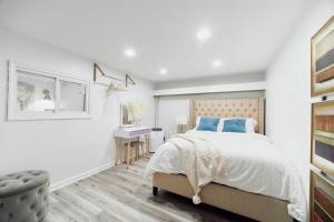 Ένα ή περισσότερα κρεβάτια σε δωμάτιο στο 3BR Private Apt near LGA, JFK, Manhattan, Northern Blvd