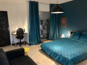 Postel nebo postele na pokoji v ubytování Chambre dans anciennes écuries