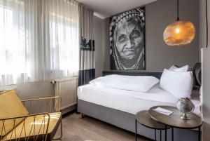 Postel nebo postele na pokoji v ubytování Best Western Hotel Nürnberg am Hauptbahnhof