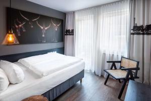 Postel nebo postele na pokoji v ubytování Best Western Hotel Nürnberg am Hauptbahnhof